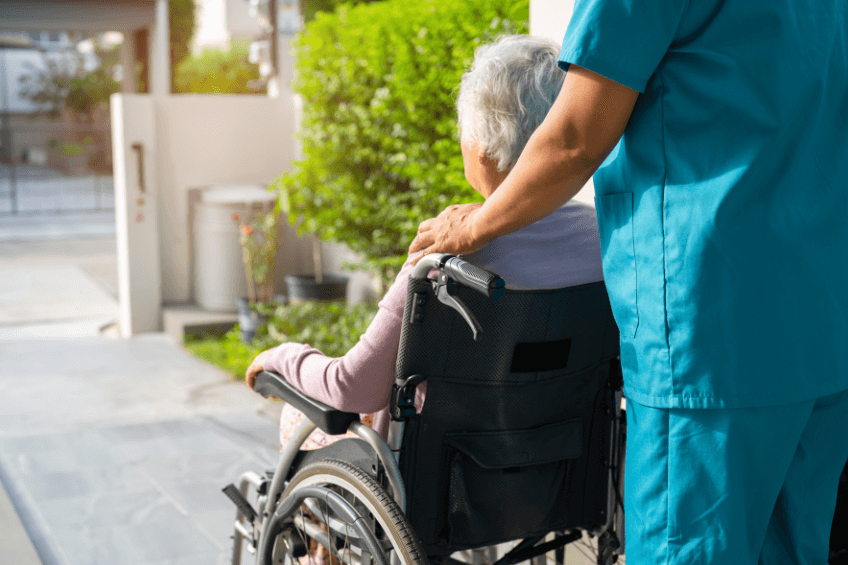 hospital discharge lady in wheelchair