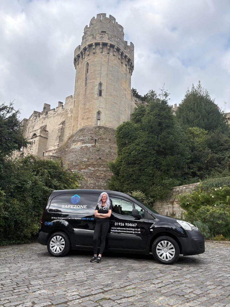 SafeZone Cleaning Services van parked near Warwick Castle