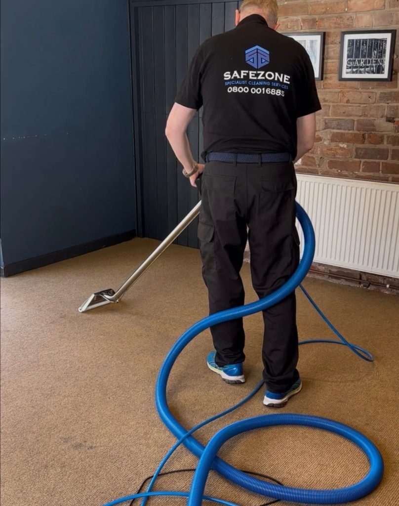 SafeZone team carrying out professional carpet cleaning in Warwickshire